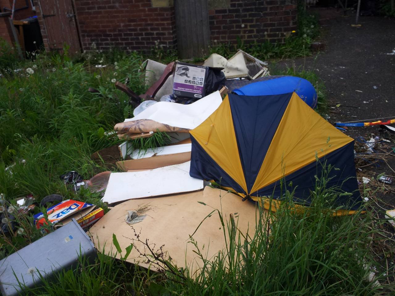 Heaps of rubbish all over the allotment.